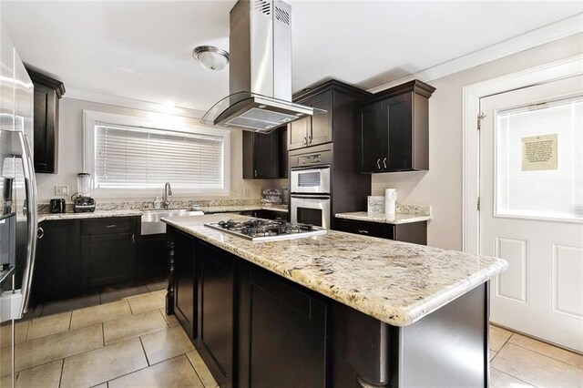 5601 Charlotte Dr, New Orleans, LA 70122 - kitchen with ornamental molding, stainless steel appliances, a sink, island range hood, and a center island