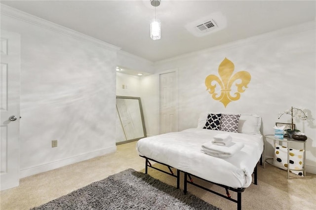 5601 Charlotte Dr, New Orleans, LA 70122 - bedroom with a closet, crown molding, carpet flooring, baseboards, and visible vents