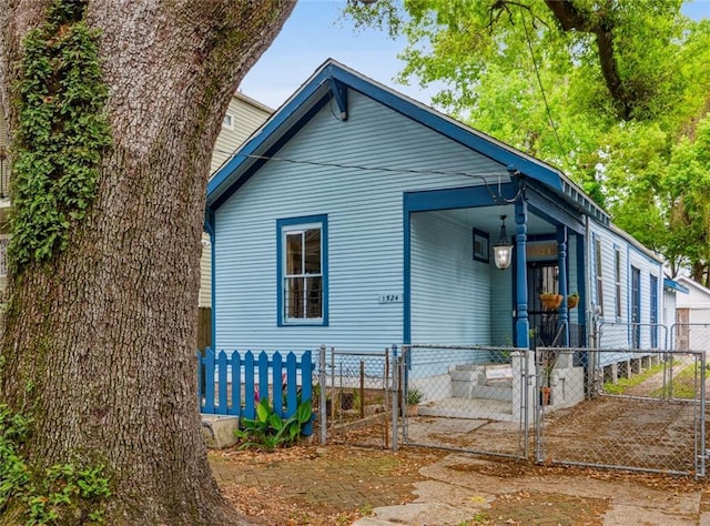 1524 N Dorgenois St, New Orleans, LA 70119 - view of side of property featuring a gate and fence