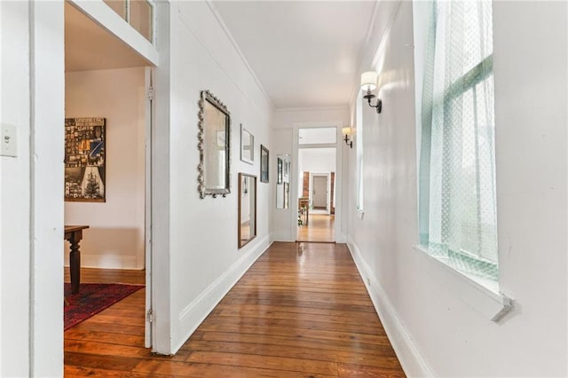 1524 N Dorgenois St, New Orleans, LA 70119 - corridor featuring hardwood / wood-style floors, ornamental molding, and baseboards