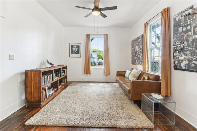 1524 N Dorgenois St, New Orleans, LA 70119 - living area with baseboards, hardwood / wood-style floors, and ceiling fan
