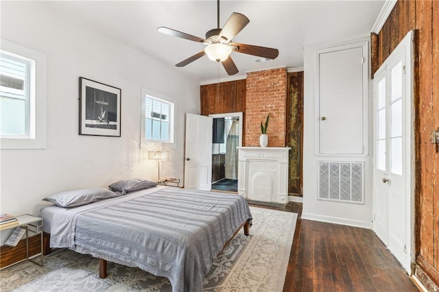 1524 N Dorgenois St, New Orleans, LA 70119 - bedroom with dark wood-type flooring and ceiling fan