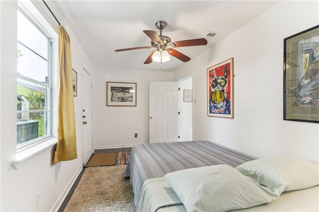 1524 N Dorgenois St, New Orleans, LA 70119 - bedroom featuring baseboards and a ceiling fan