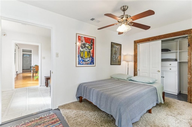 1524 N Dorgenois St, New Orleans, LA 70119 - bedroom featuring baseboards, ceiling fan, and a closet