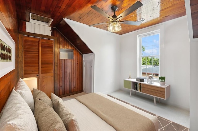 400 Fonda St, Paradis, LA 70080 - bedroom featuring carpet flooring, a ceiling fan, wooden walls, wooden ceiling, and vaulted ceiling