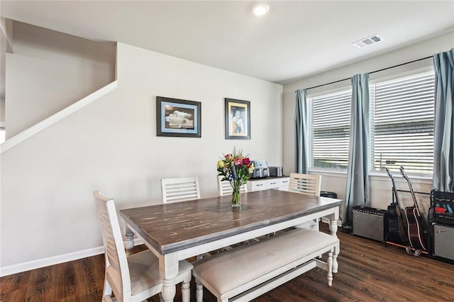 1458 Banks View St, Slidell, LA 70460 - dining room with dark wood-type flooring, baseboards, and visible vents
