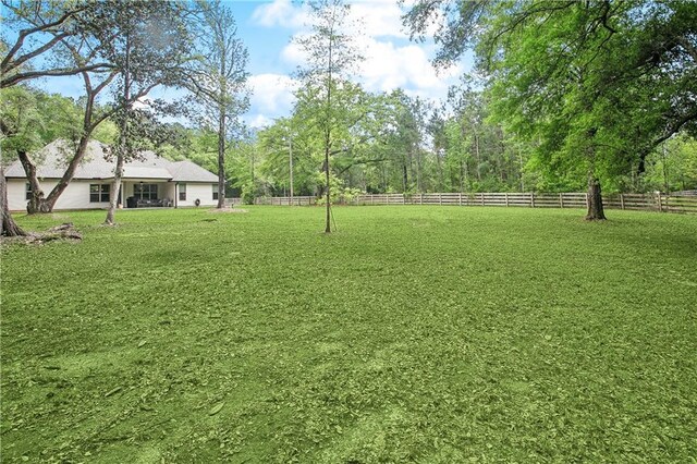 view of yard with fence