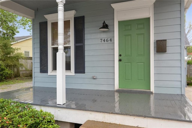 7464 Pitt St, New Orleans, LA 70118 - entrance to property with covered porch