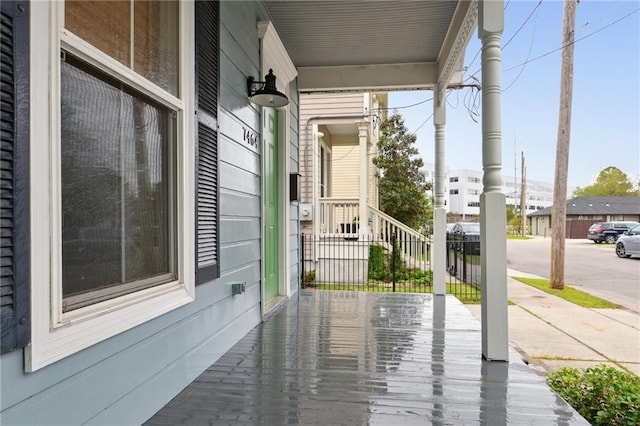 7464 Pitt St, New Orleans, LA 70118 - view of wooden porch