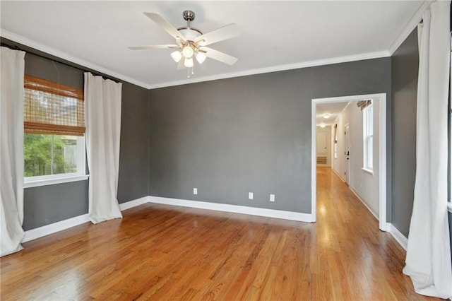 7464 Pitt St, New Orleans, LA 70118 - unfurnished room featuring crown molding, light wood-style flooring, and ceiling fan