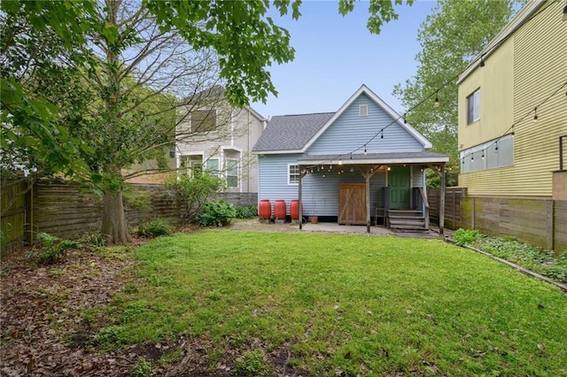 7464 Pitt St, New Orleans, LA 70118 - rear view of property with roof with shingles, a fenced backyard, and a porch