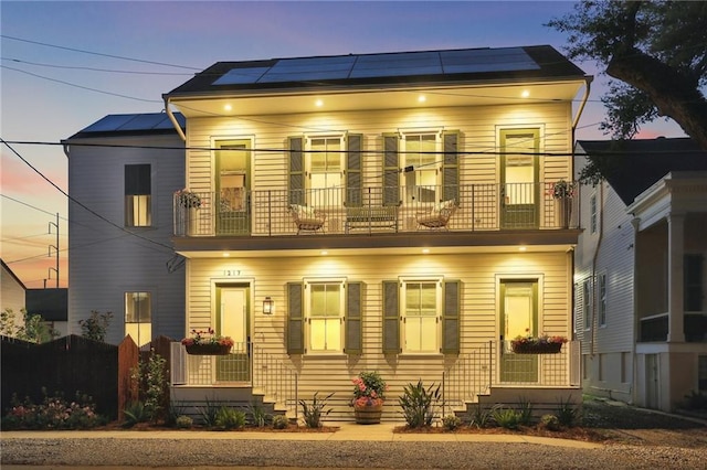 1217 N Tonti St, New Orleans, LA 70119 - view of front of home featuring a balcony and solar panels