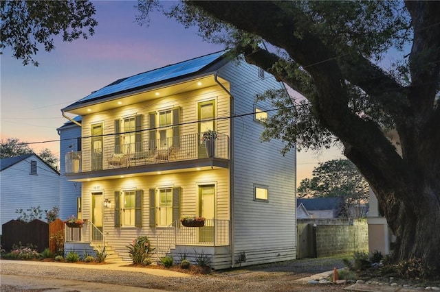 1217 N Tonti St, New Orleans, LA 70119 - view of front of home featuring a balcony and solar panels