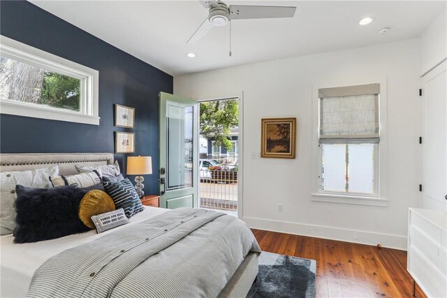 1217 N Tonti St, New Orleans, LA 70119 - bedroom with wood finished floors, access to exterior, recessed lighting, and ceiling fan