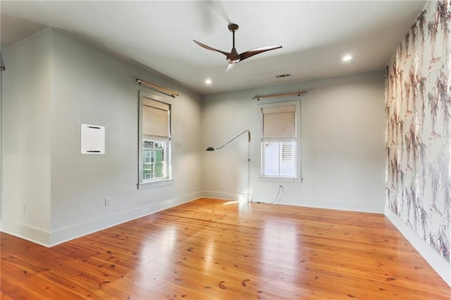 1217 N Tonti St, New Orleans, LA 70119 - empty room featuring a ceiling fan, wood-type flooring, and recessed lighting