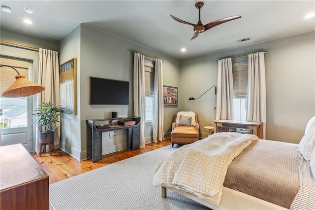 1217 N Tonti St, New Orleans, LA 70119 - bedroom with wood finished floors, recessed lighting, and a ceiling fan