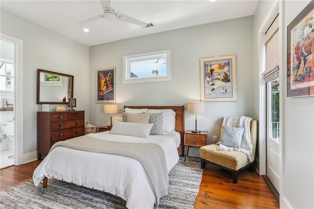 1217 N Tonti St, New Orleans, LA 70119 - bedroom with wood finished floors, recessed lighting, connected bathroom, and a ceiling fan