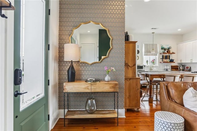 1217 N Tonti St, New Orleans, LA 70119 - foyer featuring hardwood / wood-style flooring and recessed lighting
