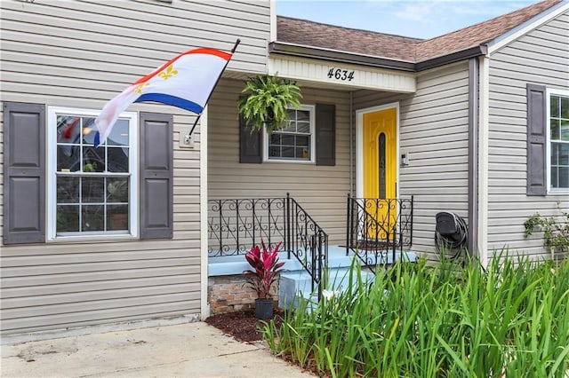 4634 Frenchmen St, New Orleans, LA 70122 - entrance to property with a shingled roof