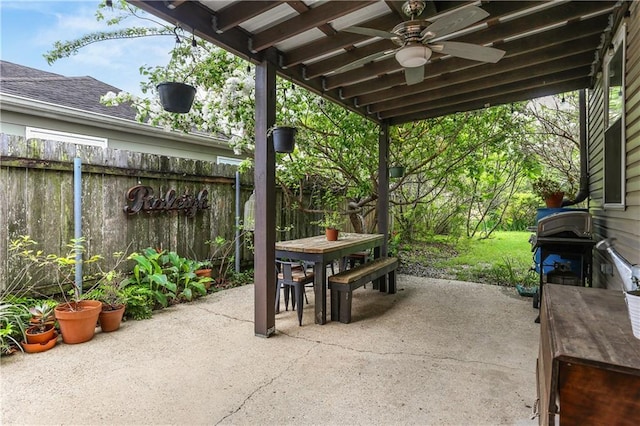 4634 Frenchmen St, New Orleans, LA 70122 - view of patio / terrace with outdoor dining space, ceiling fan, and fence