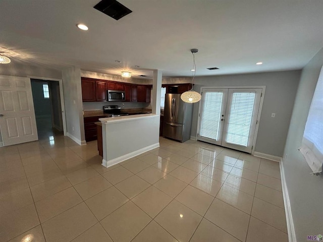 3404 Veronica Dr, Chalmette, LA 70043 - kitchen with stainless steel appliances, light tile patterned flooring, baseboards, healthy amount of natural light, and recessed lighting