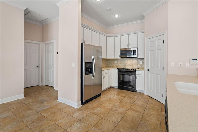 180 Cross Creek Dr Unit B, Slidell, LA 70461 - kitchen with stainless steel appliances, decorative backsplash, light countertops, white cabinetry, and crown molding