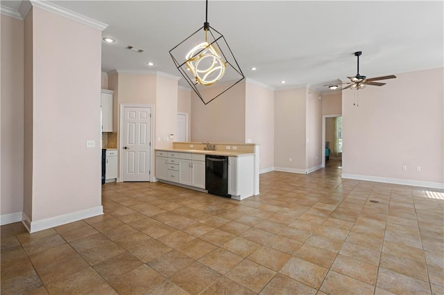 180 Cross Creek Dr Unit B, Slidell, LA 70461 - kitchen with black dishwasher, ornamental molding, recessed lighting, baseboards, and white cabinetry