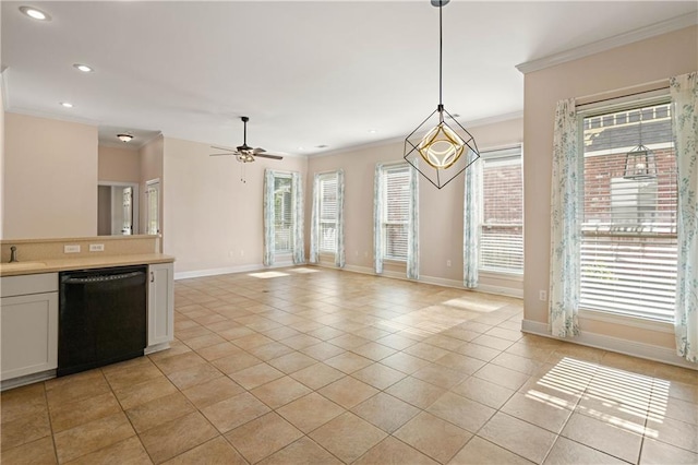 kitchen featuring light countertops, baseboards, recessed lighting, crown molding, and dishwasher