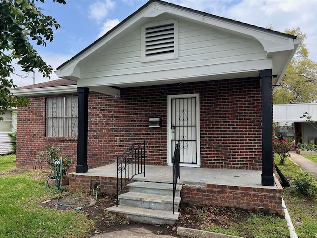 209 10th St, Bridge City, LA 70094 - view of front facade featuring brick siding