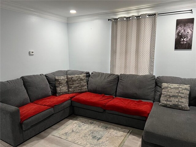 209 10th St, Bridge City, LA 70094 - living area with light wood-style floors and crown molding