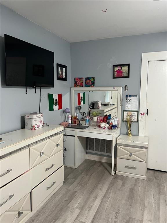 209 10th St, Bridge City, LA 70094 - home office with light wood-style flooring