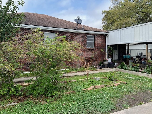 209 10th St, Bridge City, LA 70094 - back of house with brick siding