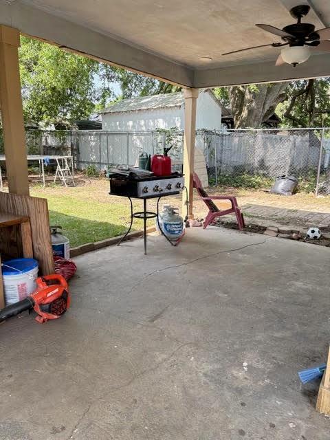 209 10th St, Bridge City, LA 70094 - view of patio with ceiling fan and a fenced backyard