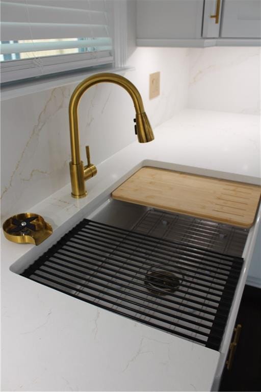 3839 Johnson St, Metairie, LA 70001 - kitchen view of a sink and decorative backsplash