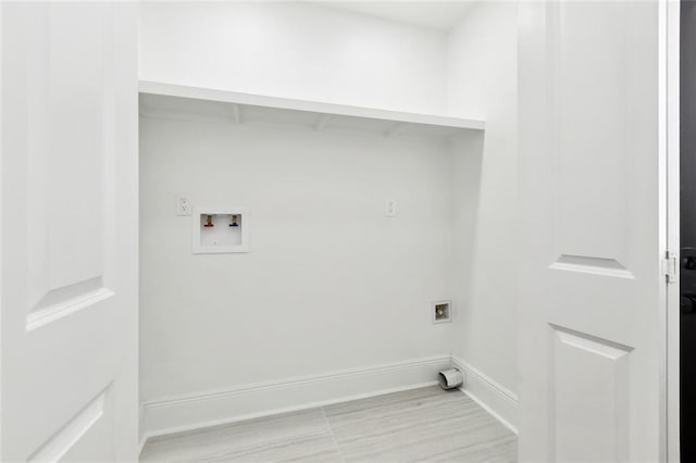 3839 Johnson St, Metairie, LA 70001 - clothes washing area featuring washer hookup and baseboards