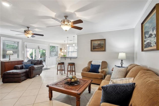972 Tavel Dr, Kenner, LA 70065 - living room with baseboards, ornamental molding, a ceiling fan, and light tile patterned floors