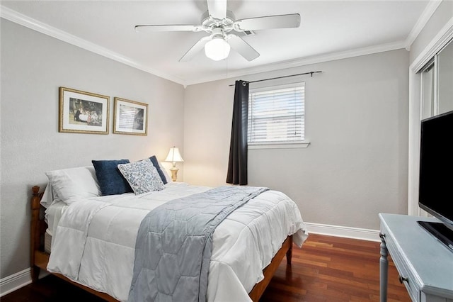 972 Tavel Dr, Kenner, LA 70065 - bedroom featuring crown molding, baseboards, ceiling fan, and wood finished floors
