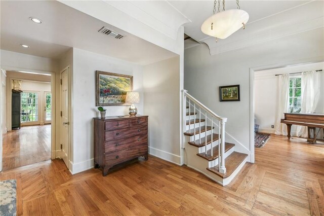 4209 Vendome Pl, New Orleans, LA 70125 - staircase featuring a wealth of natural light, visible vents, recessed lighting, and baseboards