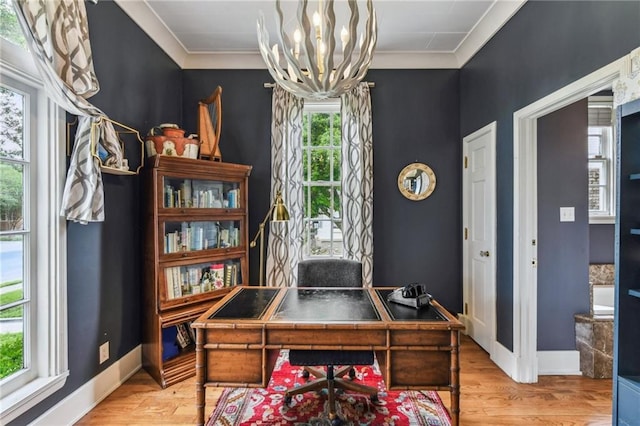 4209 Vendome Pl, New Orleans, LA 70125 - office with light wood finished floors, baseboards, a notable chandelier, and ornamental molding