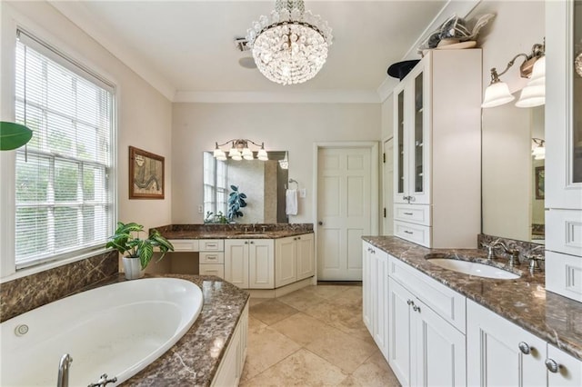 4209 Vendome Pl, New Orleans, LA 70125 - bathroom with a bath, a sink, an inviting chandelier, and crown molding
