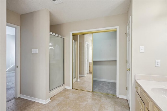 441 Parlange Dr, Pearl River, LA 70452 - full bath featuring a stall shower, vanity, and tile patterned floors