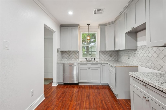kitchen with visible vents, light stone counters, dishwasher, a sink, and dark wood-style floors