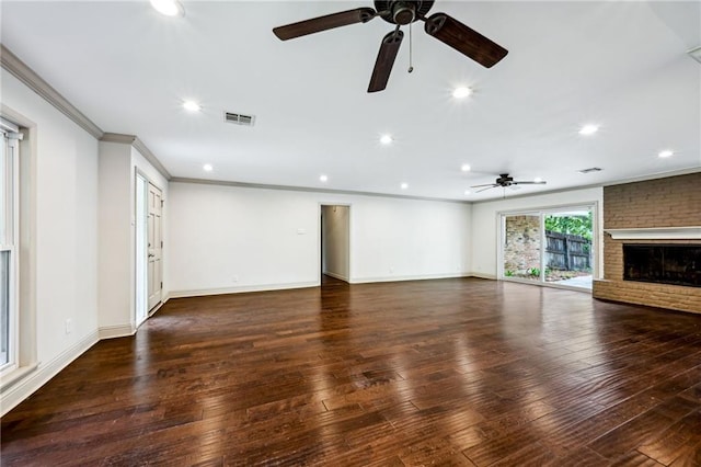 119 Belle Terre Blvd, Covington, LA 70433 - unfurnished living room featuring hardwood / wood-style floors, ceiling fan, visible vents, and a fireplace