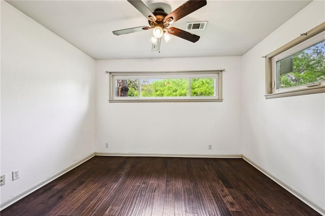 119 Belle Terre Blvd, Covington, LA 70433 - empty room featuring a wealth of natural light, visible vents, a ceiling fan, and hardwood / wood-style floors