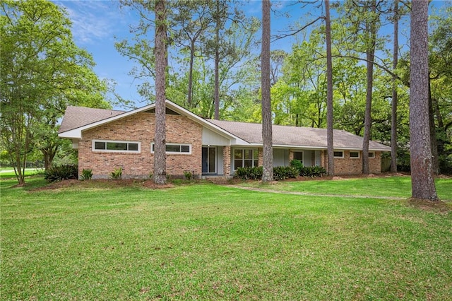 119 Belle Terre Blvd, Covington, LA 70433 - single story home featuring a front lawn and brick siding