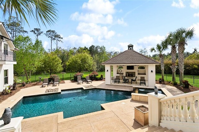 56 Preserve Ln, Mandeville, LA 70471 - view of pool featuring a patio area, a fenced in pool, a storage structure, fence, and an outdoor structure