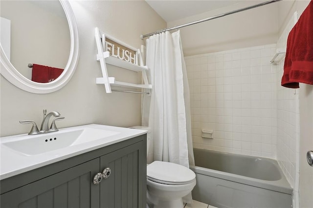 full bathroom featuring shower / bath combo, toilet, and vanity