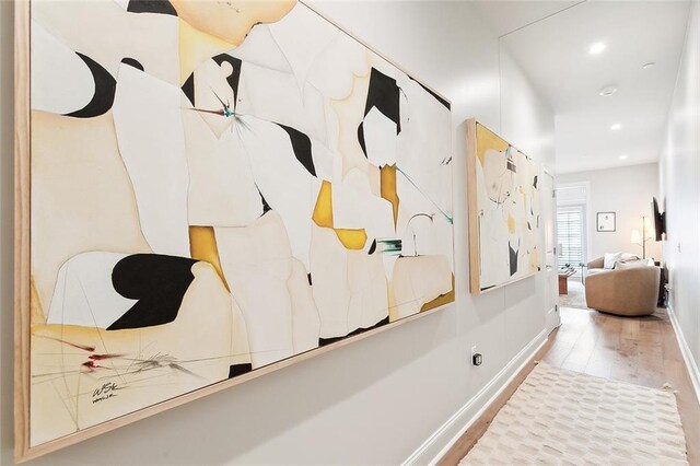 731 St Charles Ave Unit 311, New Orleans, LA 70130 - hallway featuring baseboards, wood finished floors, and recessed lighting