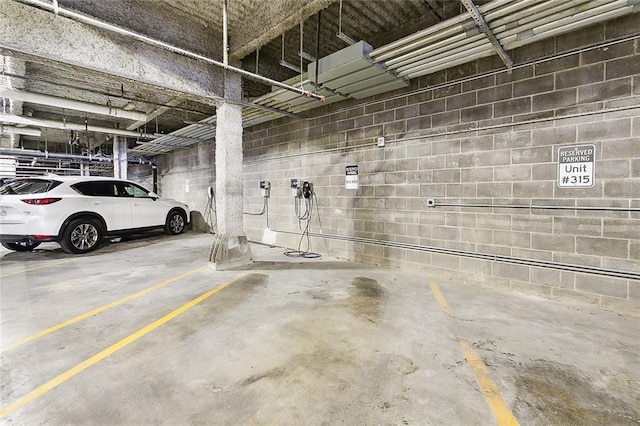 731 St Charles Ave Unit 311, New Orleans, LA 70130 - parking garage with concrete block wall