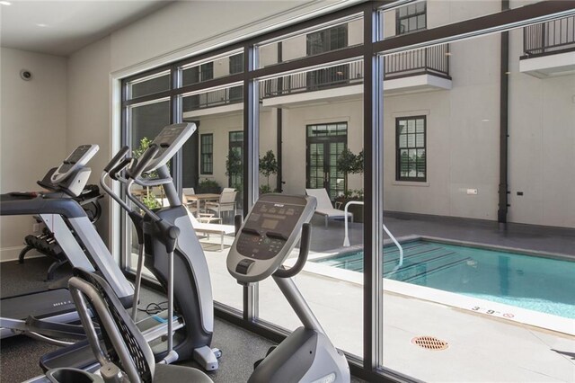 731 St Charles Ave Unit 311, New Orleans, LA 70130 - workout area with baseboards